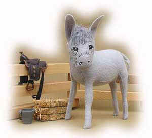 The Annalee donkey also looks great in a barnyard scene