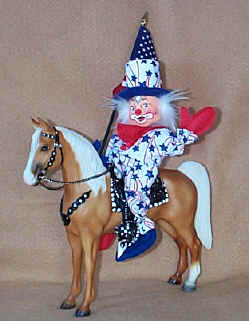 Photo of Sue Coffee Exclusives Patriotic Clown riding on a horse