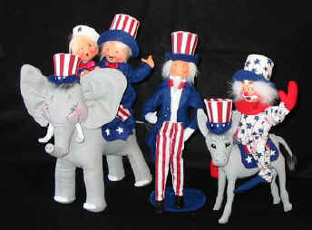 Sue Coffee Exclusives Annalee Patriotic boy and girl riding on a Patriotic Elephant and the Clown is riding Donkey.